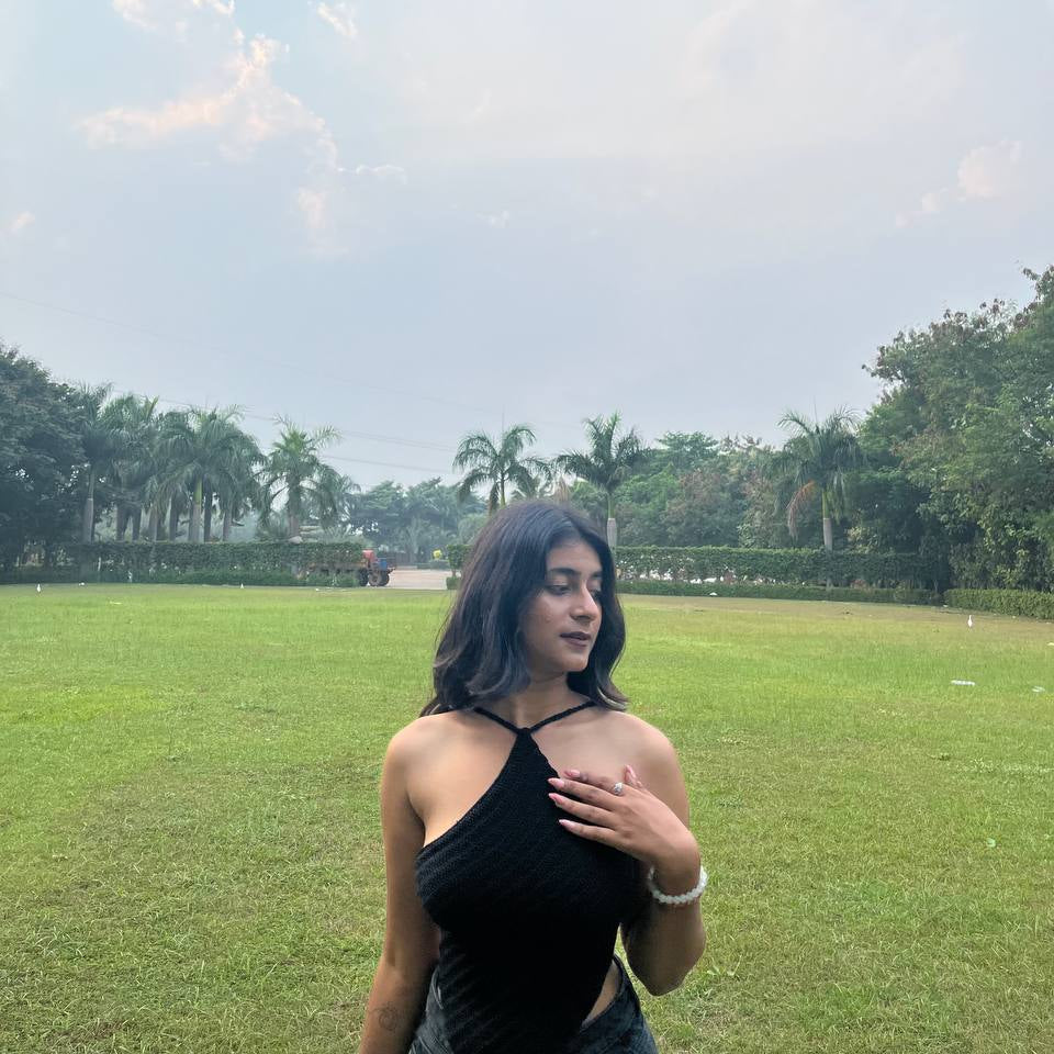 "Handmade black crochet tie-back halter top – stylish, breathable, and perfect for summer fashion."