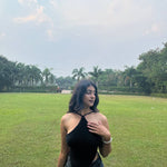 "Handmade black crochet tie-back halter top – stylish, breathable, and perfect for summer fashion."